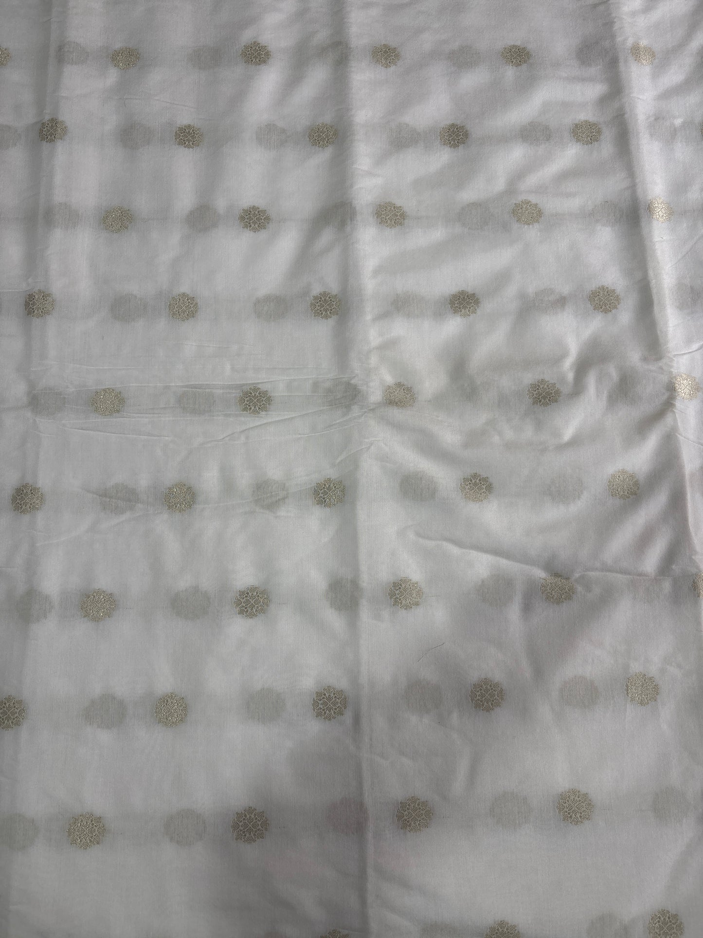 White deyable dolla Zari butti fabric