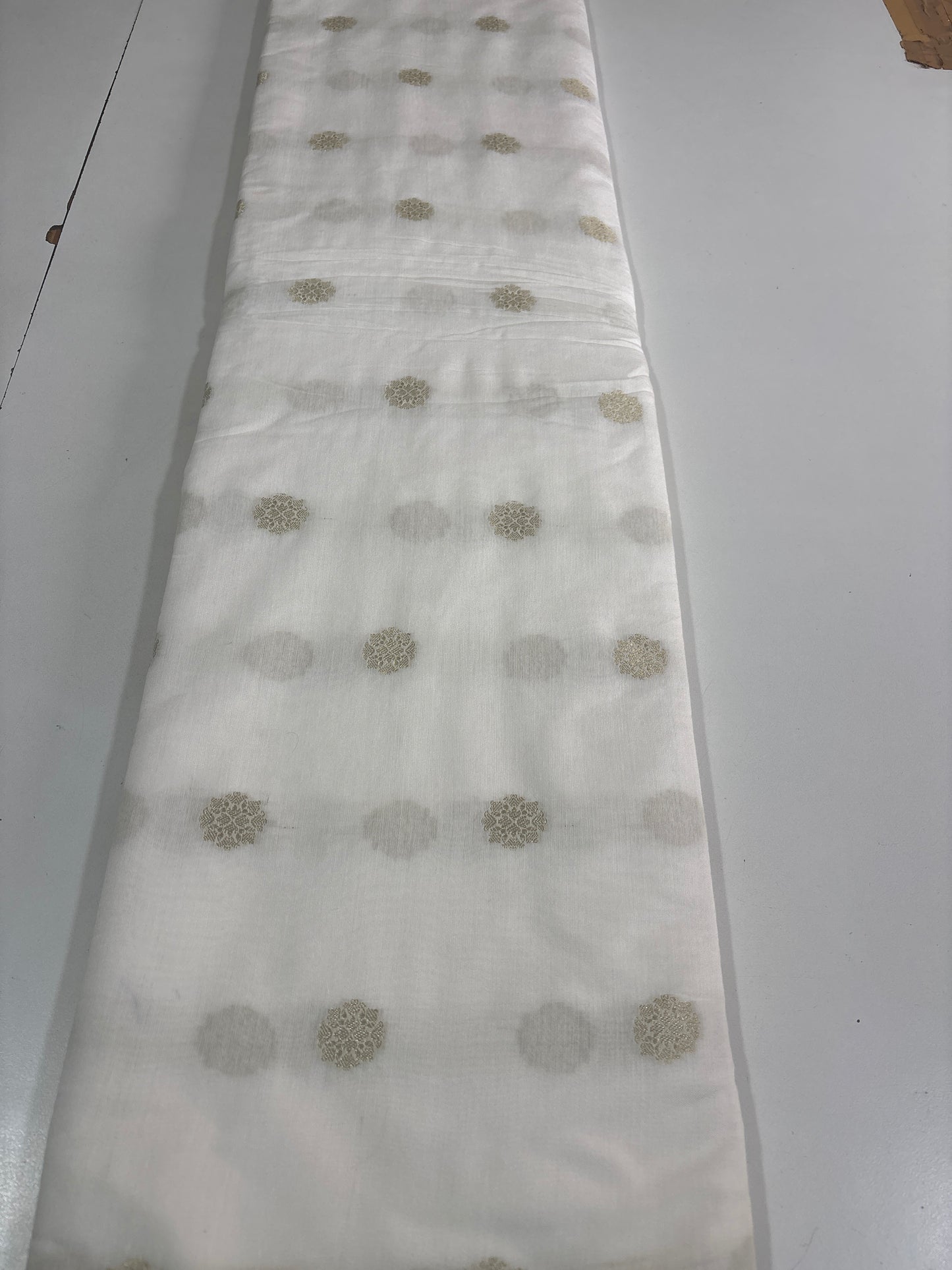 White deyable dolla  Zari butti fabric