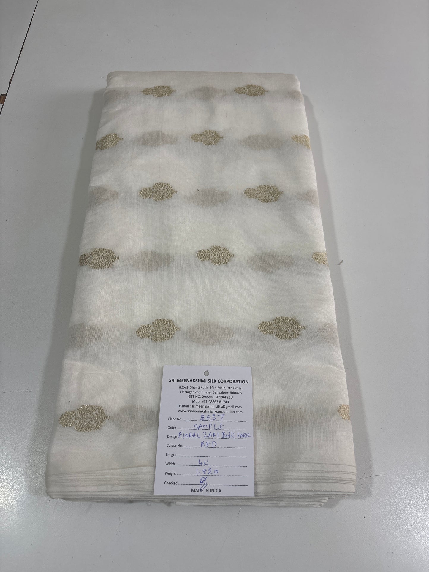 White deyable floral Zari butti fabric