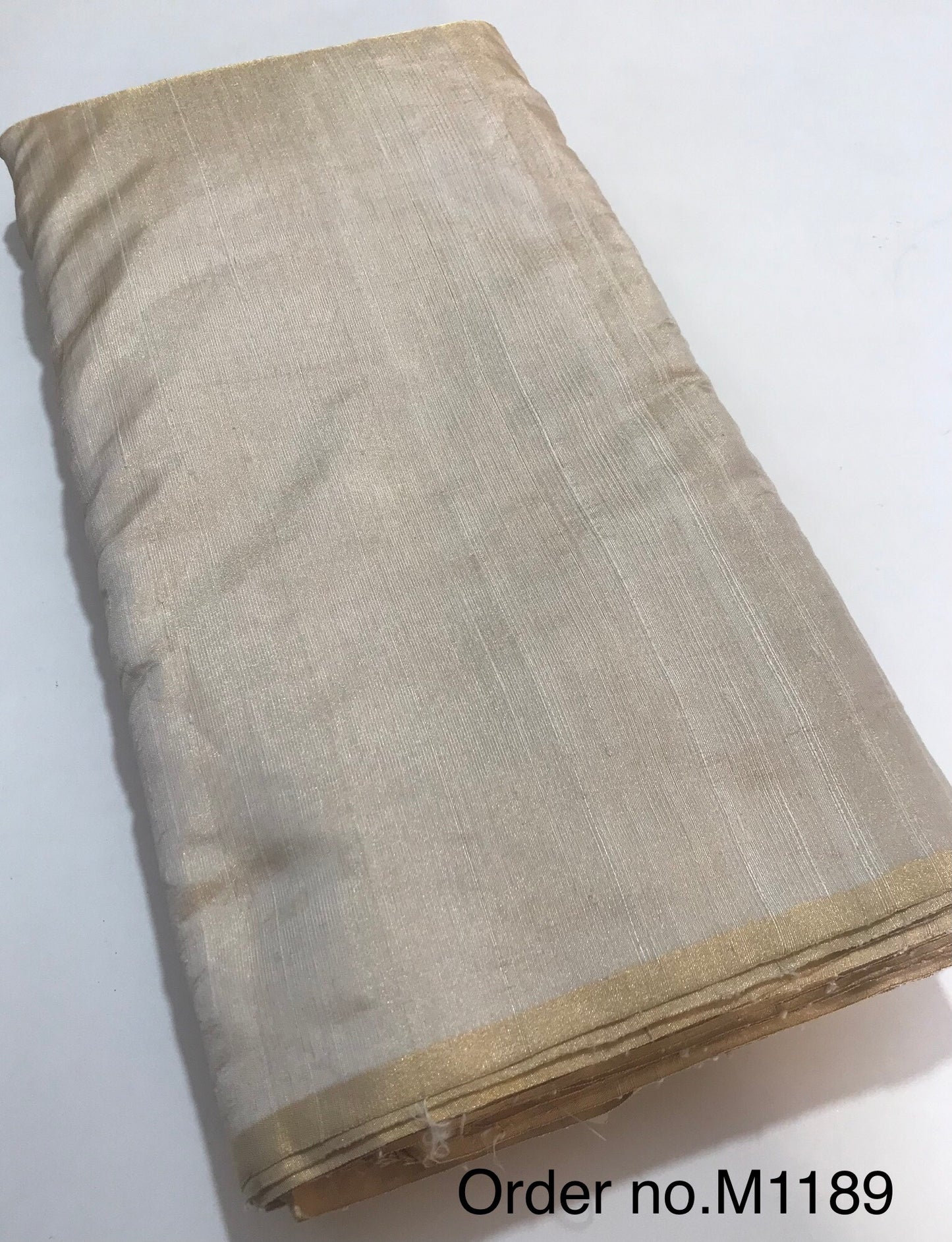 Gold tissue raw silk 105gm width 44”